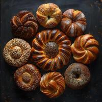 Various bread types arranged in a circle on a table photo