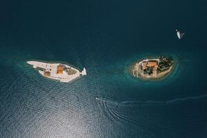 Island of Gospa od Skrpjela near the island of St. George in the sea. Montenegro. Top view photo