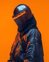 Person in black jacket and helmet in front of orange background photo