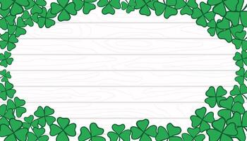 St. Patrick s Day Frame with copy space. Green leaves on white wooden texture backdrop. Shamrock and clover template, banner, background vector