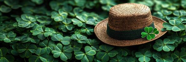 Banner St. Patrick's day with clover leaves and hat background with copy space for text photo
