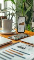 Mobile Payment App Displaying Financial Reports in a Modern Office Setting for Business Analysis photo