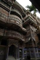 A building with many balconies and balconies on it photo