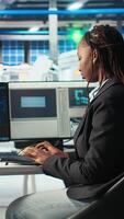 Vertical System administrator in photovoltaics factory using AI to diagnose malfunctioning systems. Solar panels manufacturing plant software developer reducing downtime using artificial intelligence, camera A video