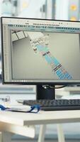 Vertical Computer monitor in empty photovoltaics factory used to diagnose malfunctioning systems. PC screen on desk in solar panels manufacturing plant used for maintaining system operational reliability video