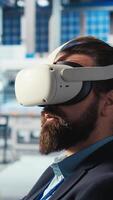 Vertical Photovoltaics factory engineer using VR goggles improving solar panels efficiency. Solar panels manufacturing plant worker using virtual reality tech researching cheaper solar solutions, camera A video