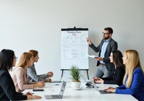 A man is giving a presentation to his colleagues photo