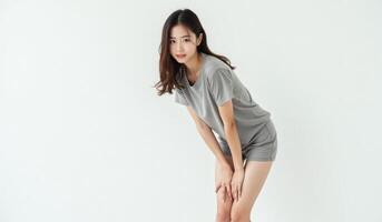 Asian woman posing in gray pajamas photo