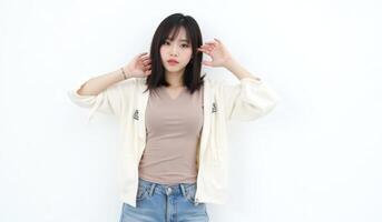 Confident Korean woman, casual outfit, subtle seductive pose, white background photo