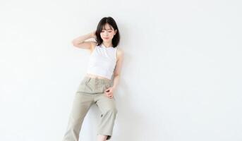 Elegant Korean woman in casual outfit, realistic seductive pose, clean white background photo