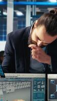 Vertical Photovoltaics factory engineer working in CAD software, brainstorming with manager. Solar panels manufacturing plant technician designing assembly lines, informing supervisor, camera B video