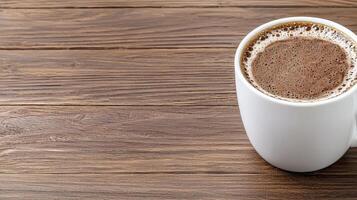 A cup of hot chocolate on a wooden table photo