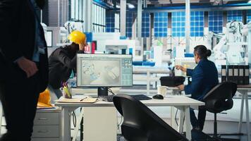 Technician in sustainable energy photovoltaics factory diagnosing broken systems. Solar panels manufacturing plant staff member working to maintain high levels of system operational reliability video