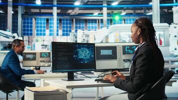 Photovoltaics factory programmer using AI technology to monitor system performance. Solar panels manufacturing plant developer using artificial intelligence to track energy production, camera A video