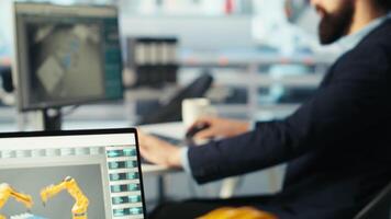 Photovoltaics factory manager brainstorms with colleague, analyzing data, reviewing metrics. Solar panels plant coworkers collaborates to troubleshoot technical issues, diagnosing faults, camera B video