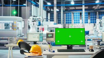 Mockup PC monitor in photovoltaics factory used for analyzing data and reviewing system metrics. Isolated screen computer in solar panels plant troubleshooting technical issues video