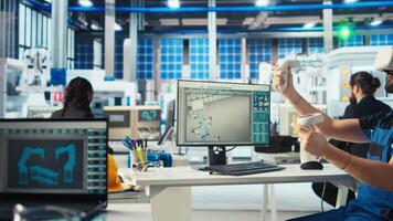 Photovoltaics factory technician using VR headset to adjust system parameters, maximizing power generation. Man using virtual reality tech, optimizing energy supply in solar panel plant, camera A video