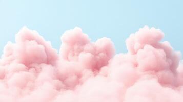 Pink fluffy clouds drift against a clear bright blue sky photo