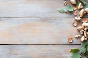 Sliced mushrooms and eucalyptus leaves on rustic wood. photo