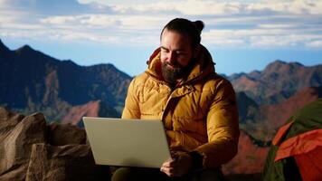 Frustrated upset entrepreneur getting tired of work problems on vacation, strong signal and internet everywhere for a person climbing on mountain top. Hiker trying to decompress. Camera B. video