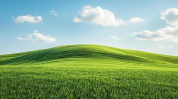 A serene landscape featuring rolling green hills under a bright blue sky with fluffy clouds photo