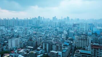 A panoramic view of a densely populated urban landscape under a cloudy sky photo