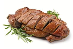 A sliced roasted duck garnished with herbs, showcasing a delicious food presentation photo