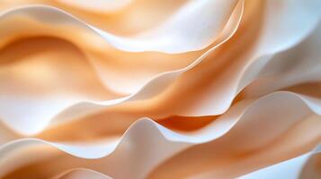 Abstract peach and white fabric texture with soft waves and folds. photo