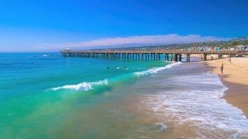 A serene beach scene with a pier, clear water, and people enjoying the sun. photo