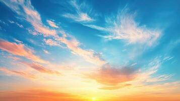 A beautiful sunset with colorful clouds in a clear blue sky. photo