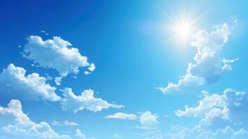 A bright blue sky with fluffy white clouds and a shining sun photo
