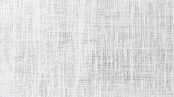 A close-up of a textured white fabric, showcasing its weave and pattern. photo