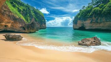 A serene beach scene with turquoise waters, golden sand, and lush cliffs in the background photo