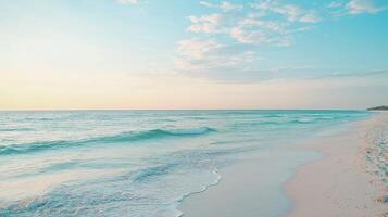 A serene beach scene with gentle waves and a colorful sky at sunset photo