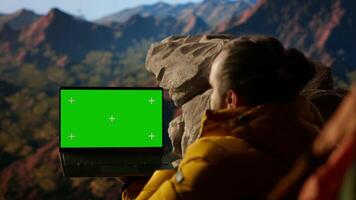 Active hiker gazes at the panoramic sky and copy space display, feeling the sense of peace that comes with exploring the great outdoors. Breathtaking landscape symbolizes resilience. Camera B. video