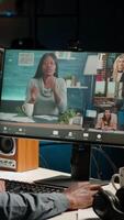 Vertical African american remote worker attending a web meeting call in a living room. Smiling black man engages in virtual communication to discuss about executive matters from home office. Camera B. video