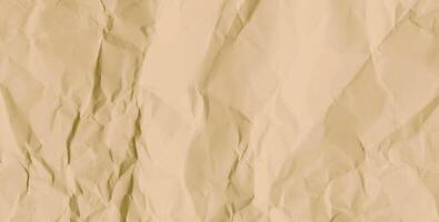 Crumpled brown craft paper texture with visible folds and creases, creating a realistic aged and wrinkled effect for backgrounds, vintage designs, banner, scrapbooking, and artistic overlays. vector