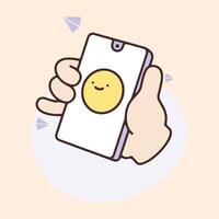A hand holds a smartphone displaying a happy yellow face. vector