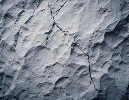 Cracked White Stone Texture with Deep Crevices and Rough Surface photo