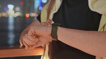 man using smartwatch, closeup view, male user tapping on sensor is play, checking notifications video