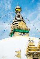 Swayambhunath is an ancient religious architecture atop a hill in the Kathmandu Valley, Nepal photo