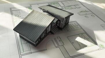 Construction blueprints concept. Residential building drawings and architectural house model on an office desk, copy space, template. Architect engineer workplace photo