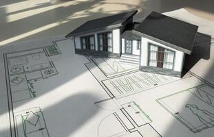 Construction blueprints concept. Residential building drawings and architectural house model on an office desk, copy space, template. Architect engineer workplace photo