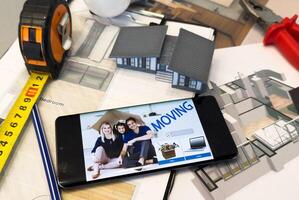 model house and mobile app for moving photo