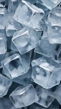 A detailed close-up photograph of ice cubes with sharp, uneven, and irregular edges. photo