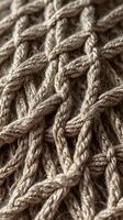 A zoomed-in capture of loops formed by knitted threads. photo