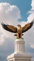 A detailed view of a golden eagle sculpture, wings open wide, with a soft-focus cloud background ideal for Presidents Day messaging. photo