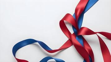 A detailed view of red and blue ribbons intertwined in a silky pattern, with a refined blank space for Presidents Day text. photo