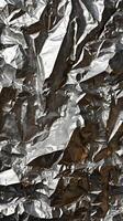 A magnified look at the textured patterns of crumpled foil. photo