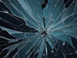 A close view of broken glass showing dramatic, intricate linework. photo